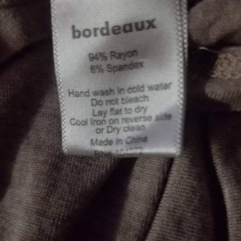 Bordeaux  size extra small longsleeve T-shirt lighttan on the bottom black on top