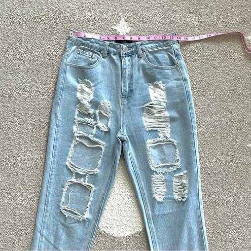 Pretty Little Thing  Kendall Light Wash Super Distressed Mom Jeans