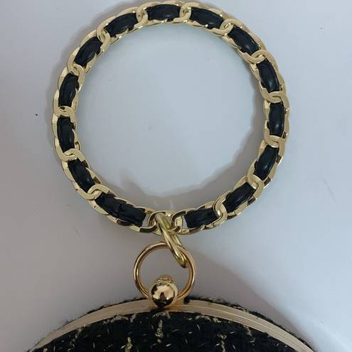 BLACK AND GOLD TWEED HARD CASE PURSE WITH BLACK LEATHER WEAVE BRACELET HANDLE