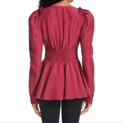 Rebellion Aje  Tucked Peplum V-Neck Long Sleeve Corset Top in Magenta