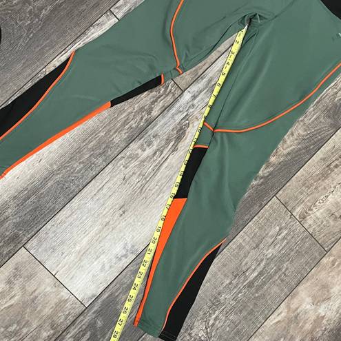 Kimberly NWT  Color Block Green Orange Black Leggings Size Medium