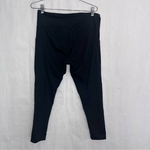 Danskin  solid black leggings with side pocket size large