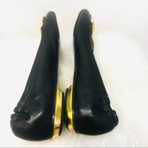 Juicy Couture  black flats with gold symbol sz 9.5