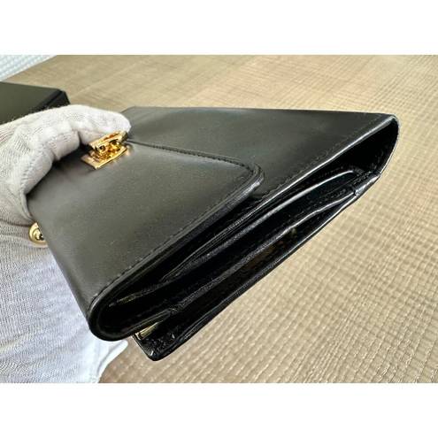 Salvatore Ferragamo Authentic  Black Leather Wallet with Gancini Clasp