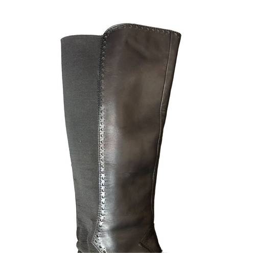 Ann Taylor  Loft black leather riding boot with stretch band in back. Pull on siz