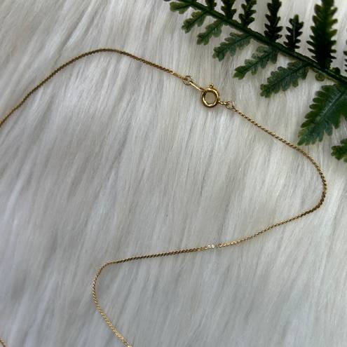 Dainty faceted rhinestones gold tone necklace