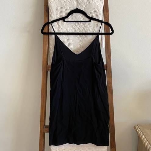 Aritzia Wilfred from  black spaghetti strap classic V neck mini dress