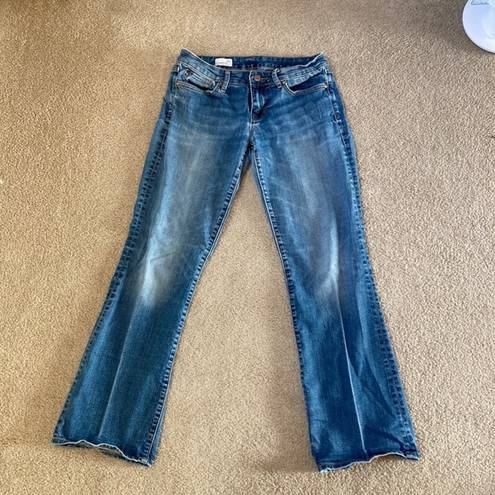 Gap  1969 blue sexy boot cut wide leg jeans in size 27