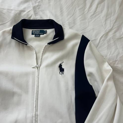 Polo by Ralph Lauren full zip jacket Size medium Condition: great Color: white and navy Details : - Full zip