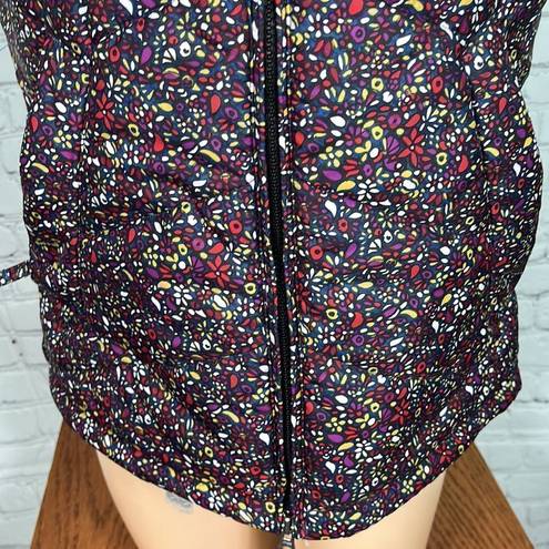 Nike  6.0 floral puffer vest. Like new. Small. florals w/cream accents EUC