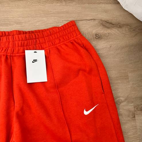 Nike swoosh red/orange sweatpants