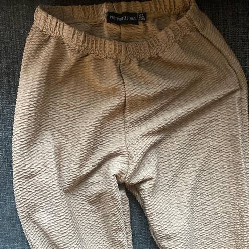 Pretty Little Thing Tan crinkly pop corn ribbed leggings