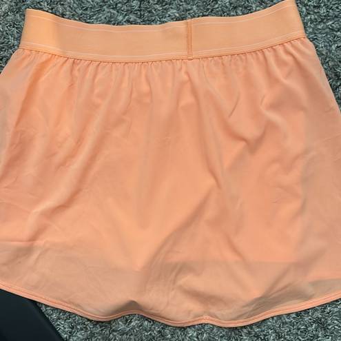 Alo Yoga Alo skort cantaloupe color size large