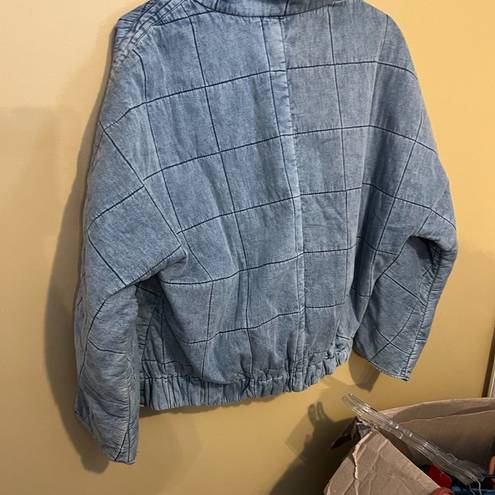 easel  medium blue jacket