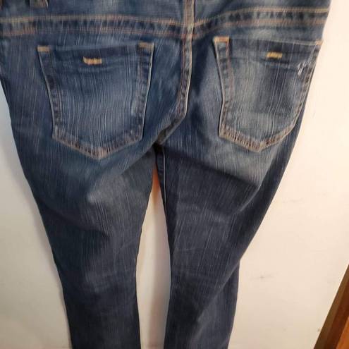 Guess  jeans size 27 skinny leg waist 30 inches inseam 31 inches distressed