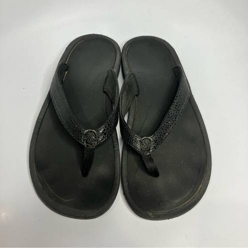 Olukai  black flip flops women’s size 7