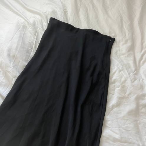 Urban Outfitters midi skirt Size medium  Condition: great  Color: black  Details : - Pull up style with side zipper