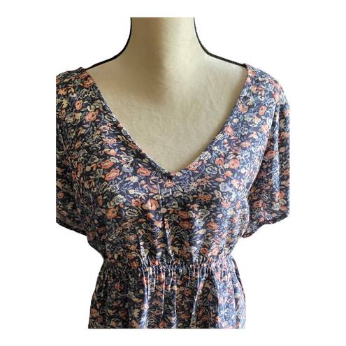 Torrid Beautiful floral babydoll tunic, short sleeves.m, cross back