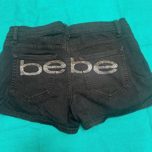 Bebe  super short black jean shorts 28 Rhinestone Logo Butt