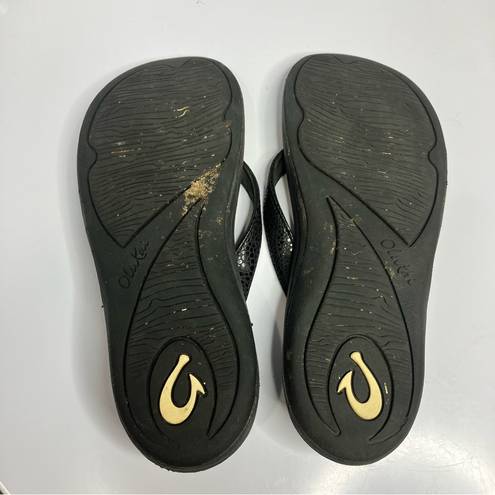 Olukai  black flip flops women’s size 7