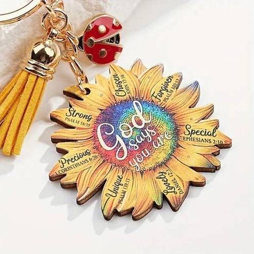 Petal New Sunflower Bag Charm Keychain "God Says You Are" each  has an attribute