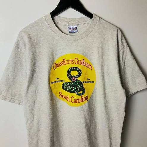 Roots 90s Vintage All Sport Grass  Guns Save Lives T Shirt Made In USA Snake