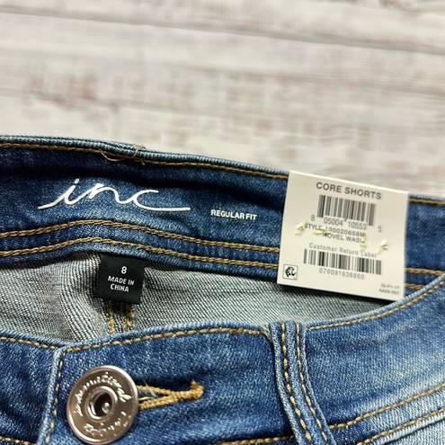 INC  distressed mid rise jeans size 8