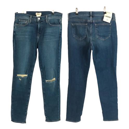 L'AGENCE MON JULES PERFECT FIT JEANS in AUTHENTIQUE DISTRESSED Size 27 NWT Reg $250  SIZE 27” inseam 28.5" rise 9.25" leg opening 5.75" Elevate your denim game with these  MON JULES jeans in a beautiful blue color and solid pattern. The distressed accents give them an authentique look, while the mid-rise and straight style provide a perfect fit. These jeans feature a zip closure and belt loops, making them a stylish and practical addition to your wardrobe.   Made with a blend of polyester, spandex, cotton, and denim fabric, these jeans boast a stretchy and comfortable feel. With a 28.5" inseam and 5.75" leg opening, these jeans are perfect for any season and occasion. Get ready to rock these jeans and unleash your inner fashionista!