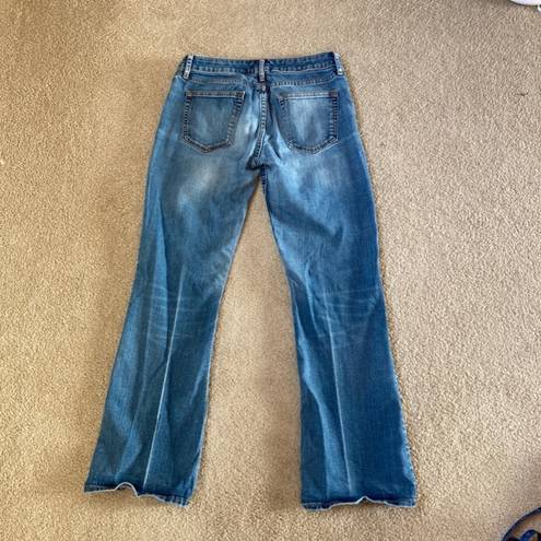 Gap  1969 blue sexy boot cut wide leg jeans in size 27