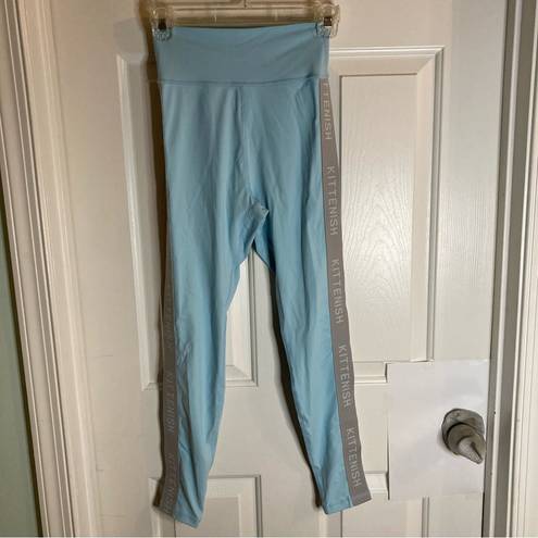 Kittenish  NEW with tags, teal blue active leggings size XS, athleisure, panels