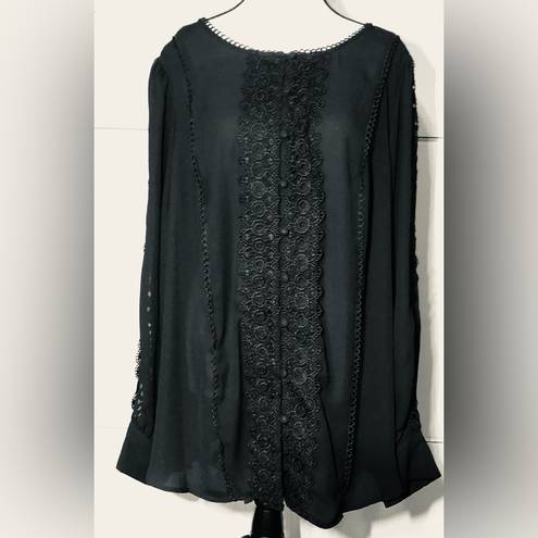 Torrid women’s 3X flowy slightly sheer blouse.