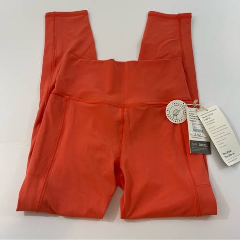 Vuori  Studio Pocket Leggings in Grapefruit Size S