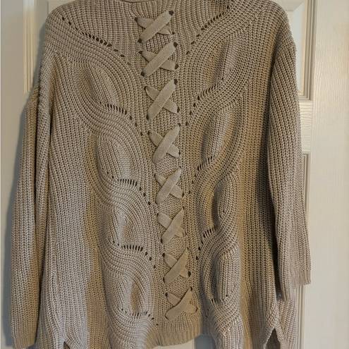 Tan knitted sweater cardigan with cross stitched pattern on back Size L