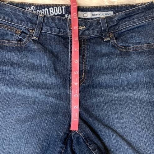 DKNY  stretch Soho boot jeans raw hem mid rise 8L