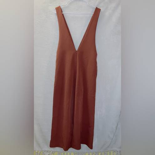 The Row all :  rustic orange mauve deep v neck sleeveless wide leg crop jumpsuit