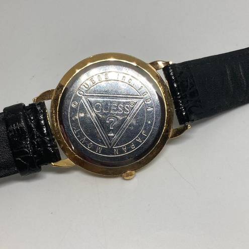 GUESS Woman’s gold plated quartz Japan mov  black leather band wrist watch!