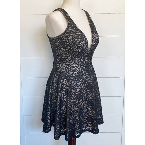 EXPRESS black lace dress with tan lining metal v-neck cleavage - $31 New  With Tags - From Gina