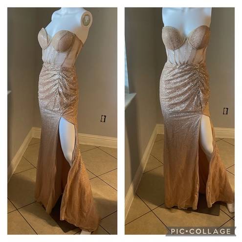 Cinderella Divine Women’s formal sparkly dress size 4
Brand is 
Rose gold color