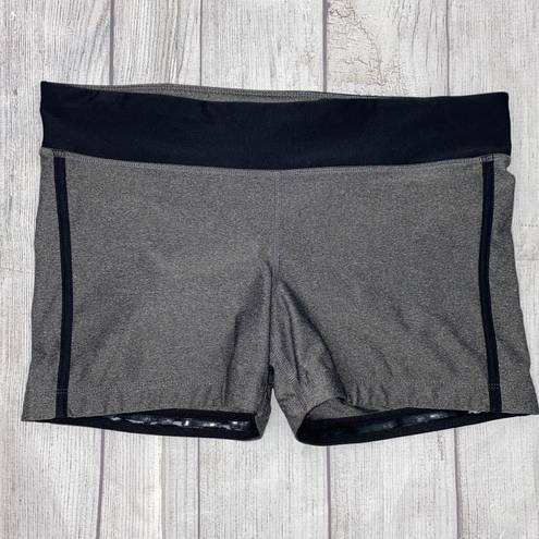 Xersion fitted athletic shorts with no slip hem, black and grey women size Large