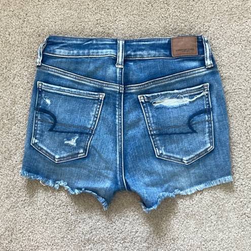 American Eagle  high rise shortie distressed jean shorts in size 2