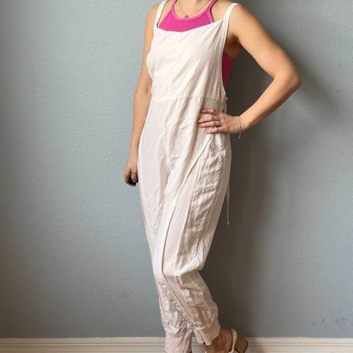 Free People Movement  One Piece Split Rock Jumpsuit in Ivory Size Small