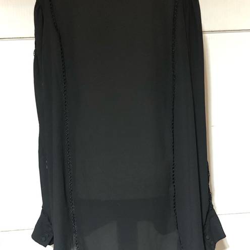 Torrid women’s 3X flowy slightly sheer blouse.