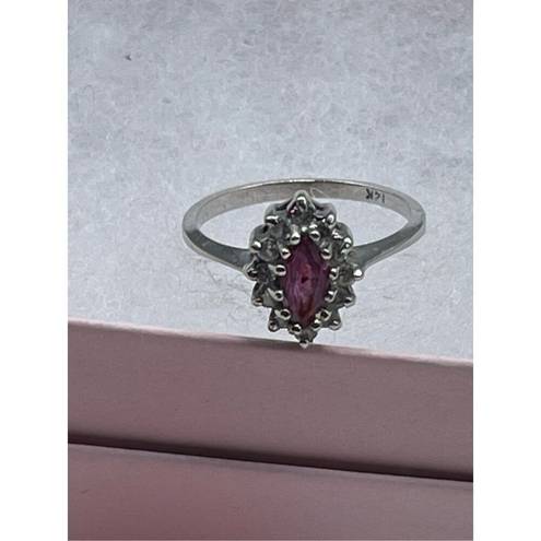 Ruby 14K size 6 white gold  and diamond ring.