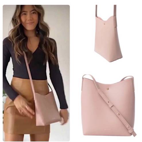 Anthropologie Samara |  vegan leather cross body shoulder bag in Peony Pink