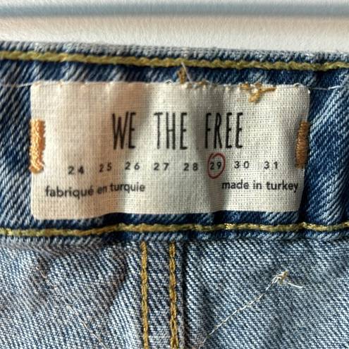 We The Free  embellished straight leg med wash jean in size 29.