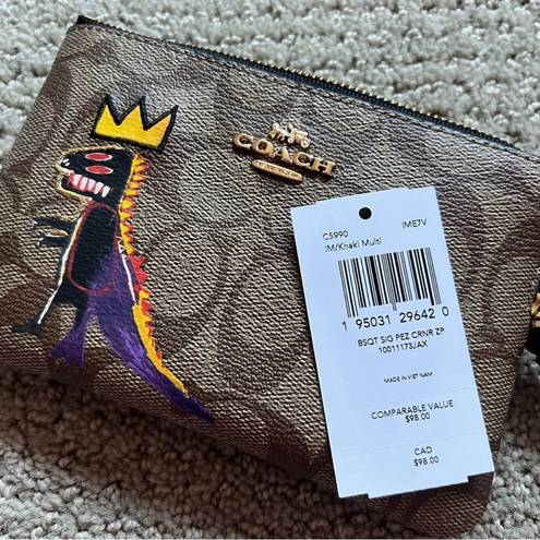 Coach  X JEAN-MICHEL BASQUIAT CORNER ZIP WRISTLET IN SIGNATURE CANVAS c5990