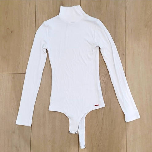 n:philanthropy  Brooke Turtleneck Bodysuit in White