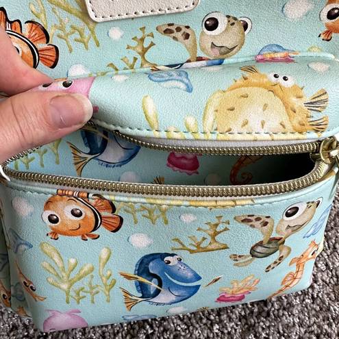 Lounge Fly  Disney Pixar Find Nemo Collage Mini Backpack in Light Blue