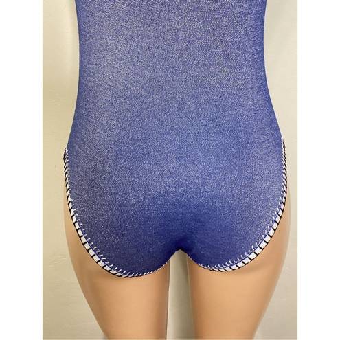 PilyQ New.  Platinum silver blue crochet one piece. Size small. Retails $168