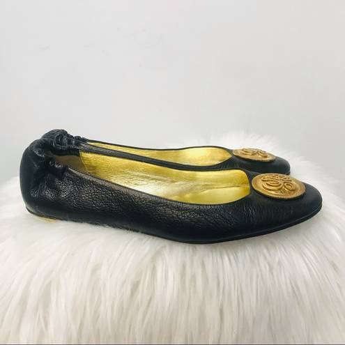 Juicy Couture  black flats with gold symbol sz 9.5